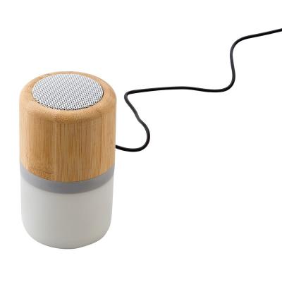 Image of Plastic and bamboo wireless speaker
