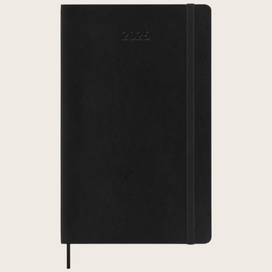 A black Moleskine 2025 diary.