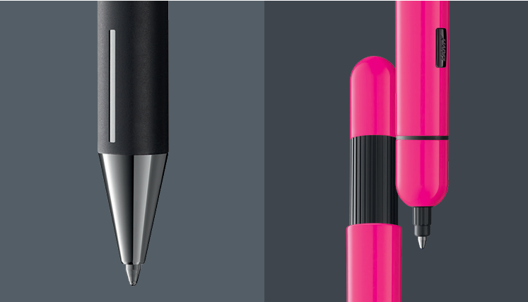 Black rollerball pen and neon pink LAMY Pico pen on contrasting dark grey backgrounds.