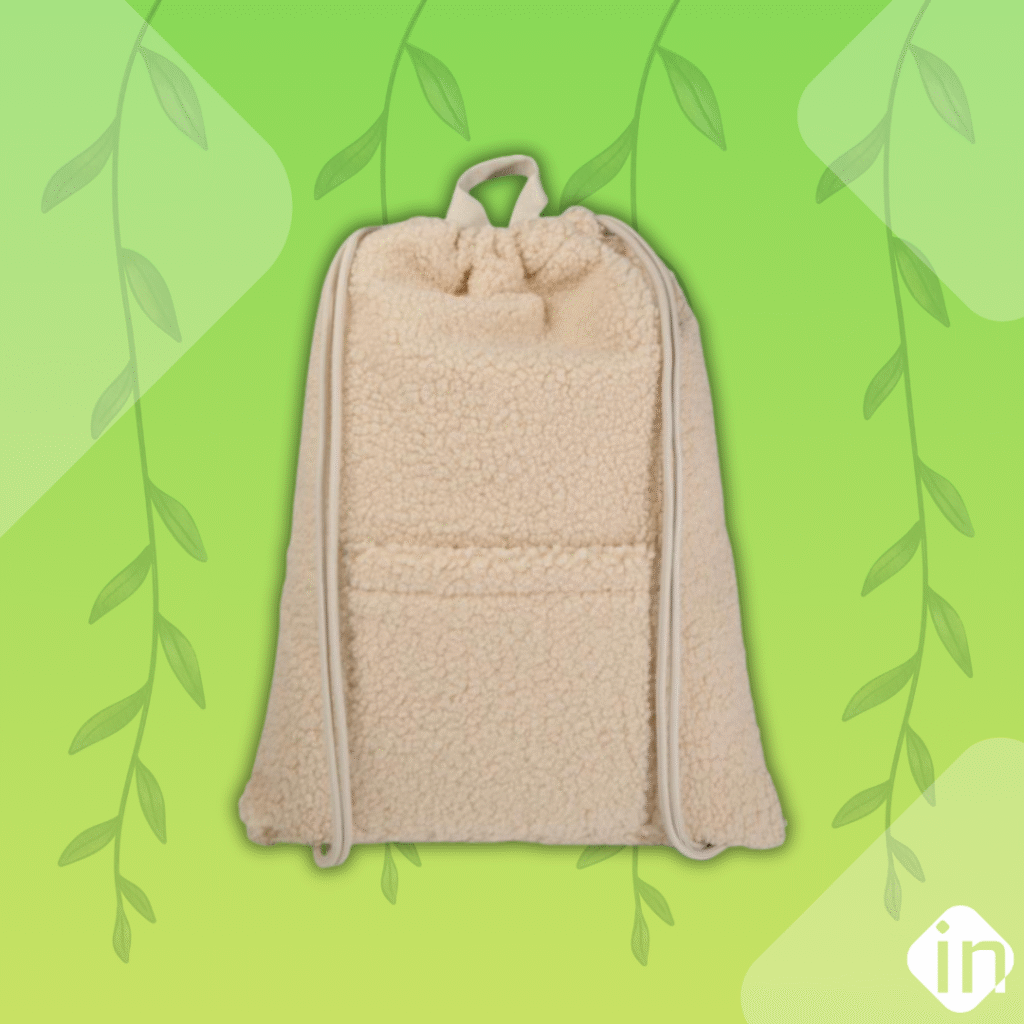 A lime green gradient background with eco-friendly vines faded into the background. This image has a recycled sherpa draw string bag displayed as well as our logo and signature diamond shape on the image.